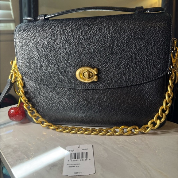 Coach Cassie Top Handle Black Pebbled Leather
Convertible Bag - Picture 13 of 16